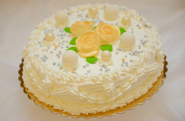 istock Delicious Wedding Cake at the party. Smoke and fire effects. 1191563925