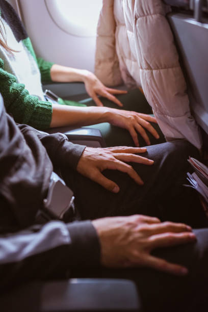 istock Passengers sitting in the airplane 1191566194