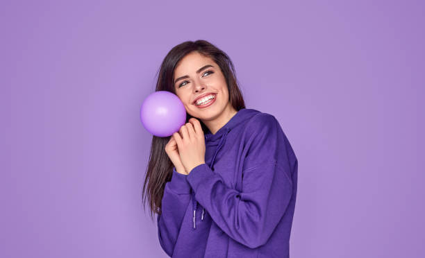 istock Delighted lady with balloon during party 1191566276