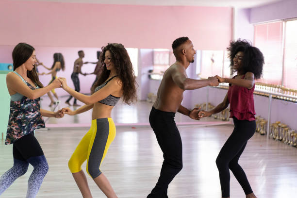 istock Group of dancers practicing in pairs in studio 1191566392