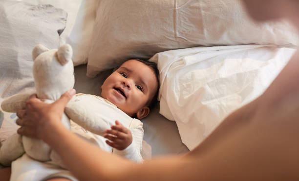 istock Putting Baby to Bed 1191574602