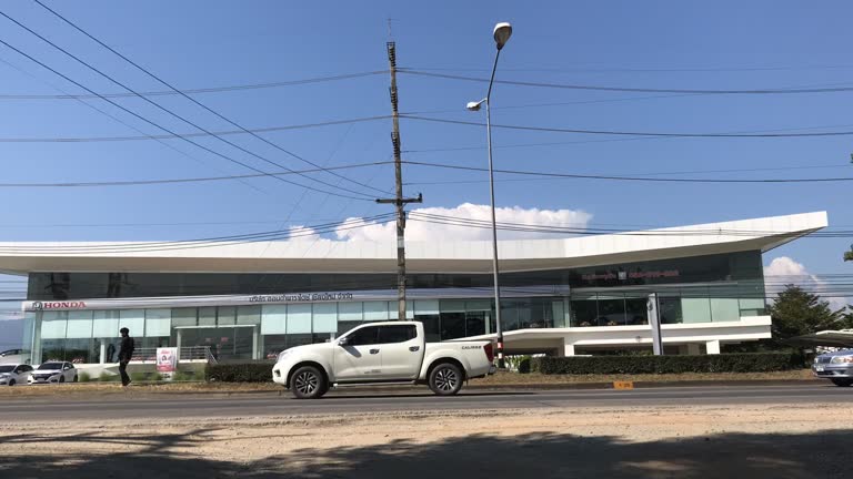 Time Lapse of Car and Traffic on road near Junction.