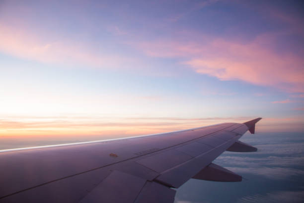 istock Sunset through window of aircraft. 1191590080