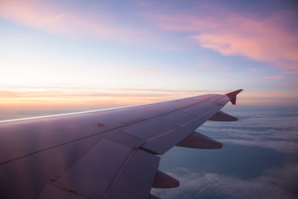 istock Sunset through window of aircraft. 1191590100