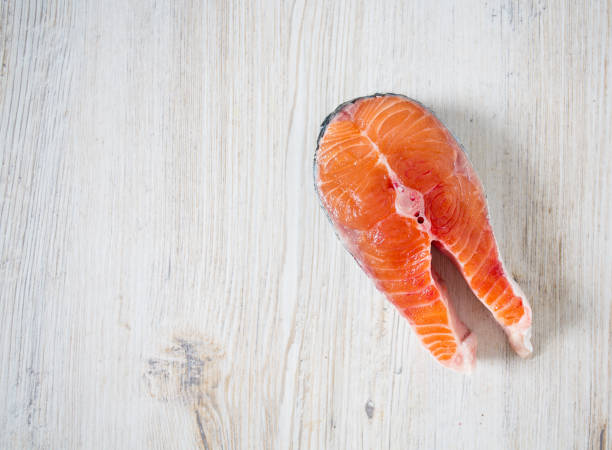salmon on wooden surface