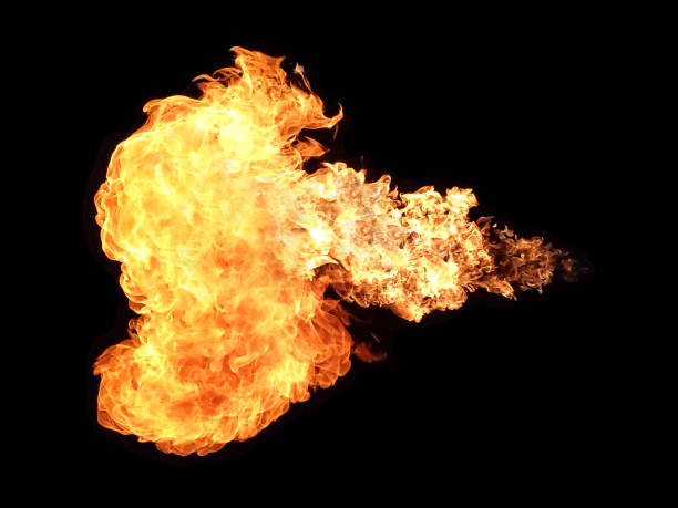 flamethrower with black background - flamethrower imagens e fotografias de stock