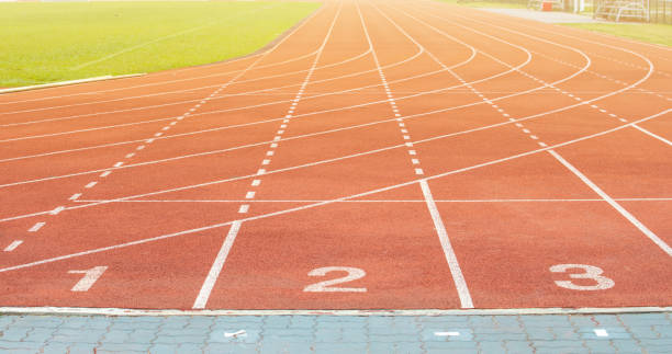 The number at start point of running track or athlete track in stadium. Running track is a rubberized artificial running surface for track and field athletics. track and field stock pictures, royalty-free photos & images