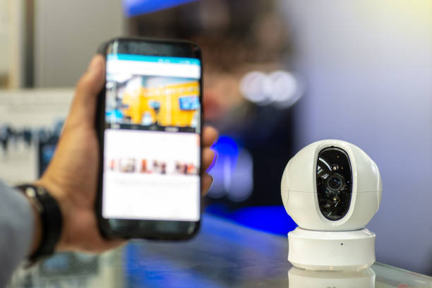 istock Security camera. IP Camera connecting to smart phone. 1191600448