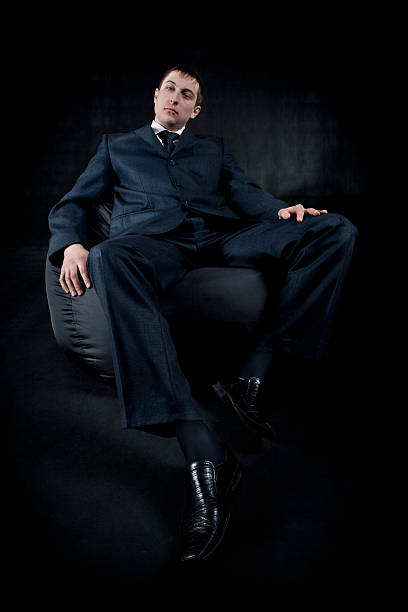 istock businessman on dark background 119160098