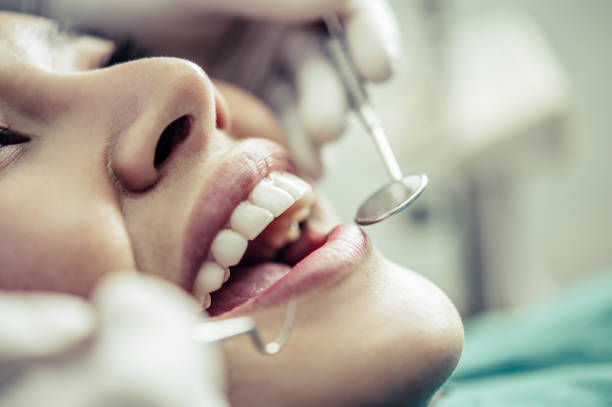 istock Dentists treat patients' teeth. 1191603037