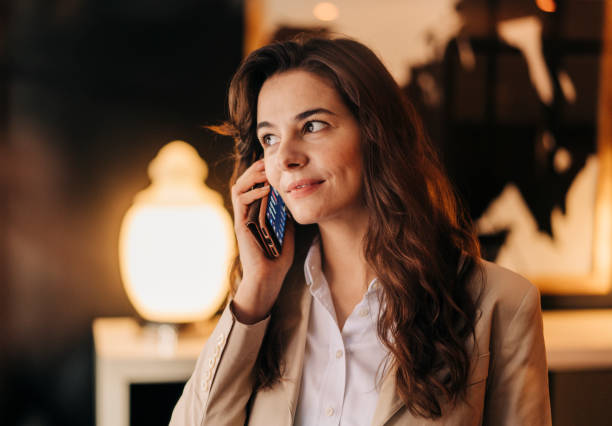 istock Businesswoman talking through mobile phone 1191603207