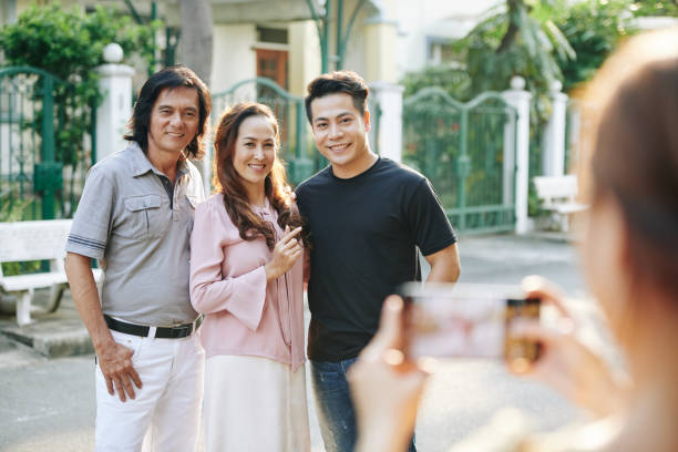 istock Family posing for photo 1191606023