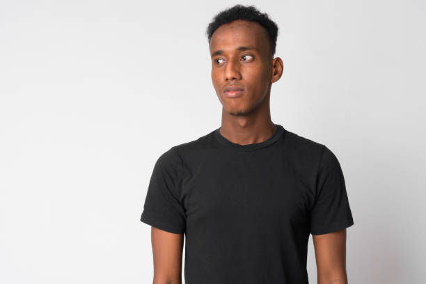 istock Portrait of young handsome African man thinking 1191607076