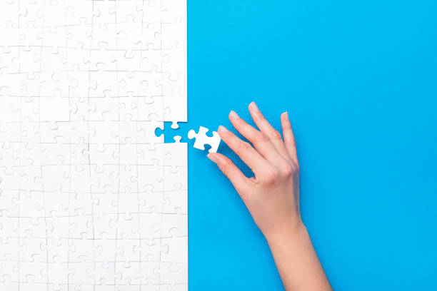 istock Business concept of white jigsaw puzzle. 1191609147