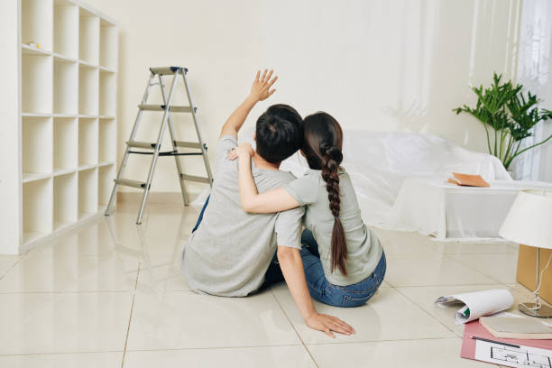 istock Couple planning renovation 1191610784