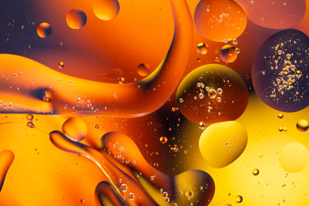 istock Close-up water and oil abstract in a rainbow lighting effect 1191610798