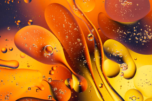 istock Close-up water and oil abstract in a rainbow lighting effect 1191610810