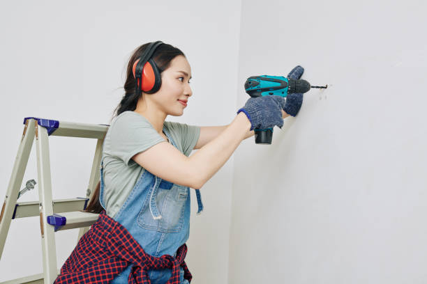 istock Woman remodeling new apartment 1191611083