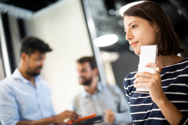 istock A young beautiful woman holding some tile samples in her hand 1191616011