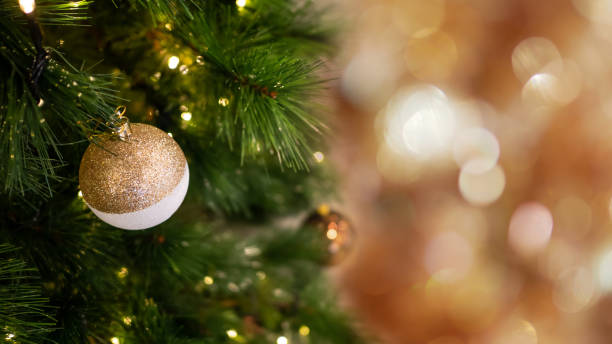 istock Christmas tree with decorations and lights background 1191616658