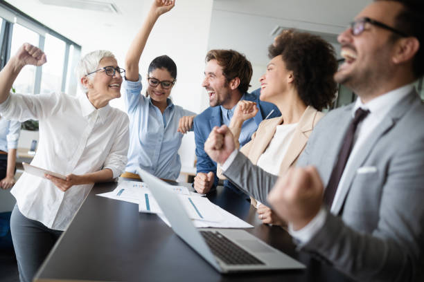 istock Successful business group of people at work in office 1191616712