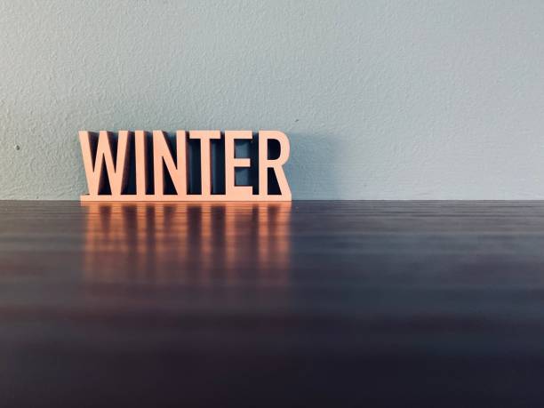 istock Word WINTER on blue background 1191619815