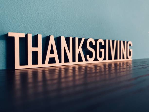 istock Word THANKSGIVING on blue background 1191619860