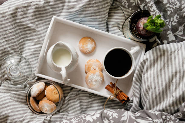 istock breakfast in bed. top view. Coffee with cookies on a tray 1191620751