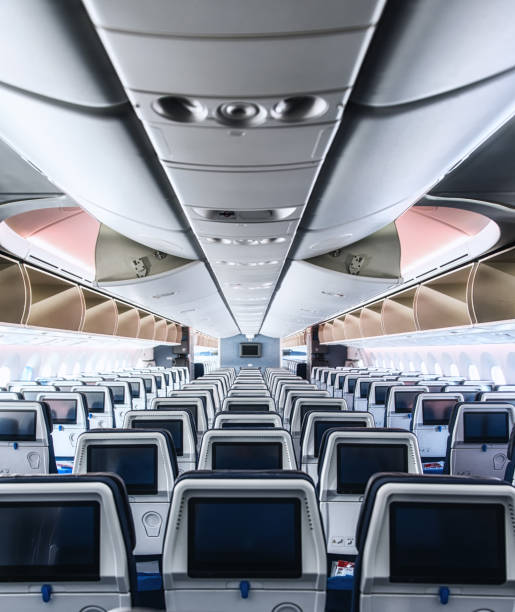 istock Cabin interior of a modern passenger aircraft (wide body) 1191620813