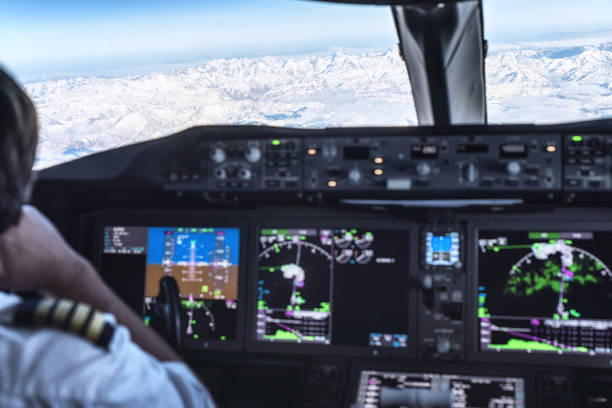 istock Pilots in the Cockpit - Preparing for Landing 1191620915