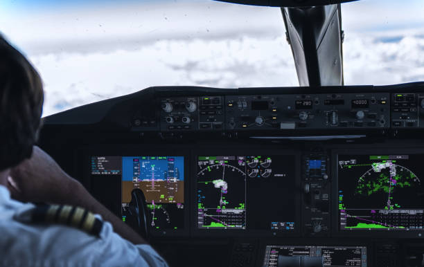 istock Pilots in the Cockpit - Preparing for Landing 1191620921