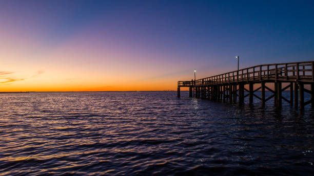 istock Evening sky at twilight on Mobile Bay, Alabama 1191622212