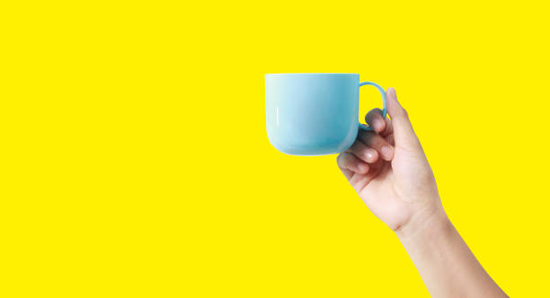 istock Hand holding plastic cup like a pouring 1191622244