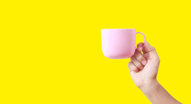 istock Hand holding plastic cup like a pouring 1191622246