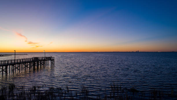 istock Evening sky at twilight on Mobile Bay, Alabama 1191622382