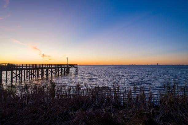 istock Evening sky at twilight on Mobile Bay, Alabama 1191622397