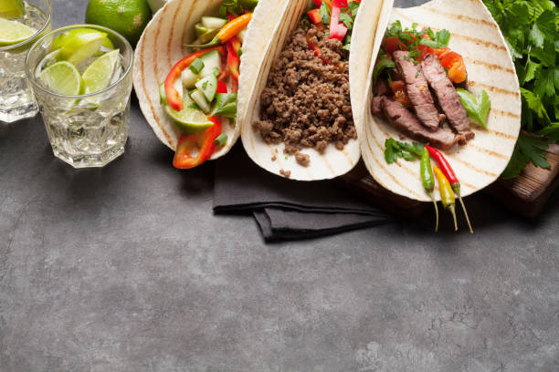 istock Mexican tacos and caipirinha cocktail 1191629923