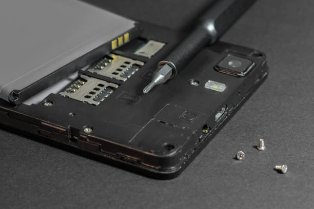istock Repair smartphone, disassembled phone with a screwdriver 1191630223
