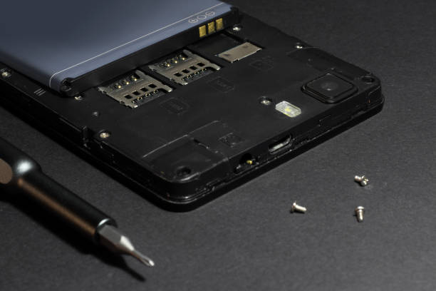 istock Repair smartphone, disassembled phone with a screwdriver 1191630224