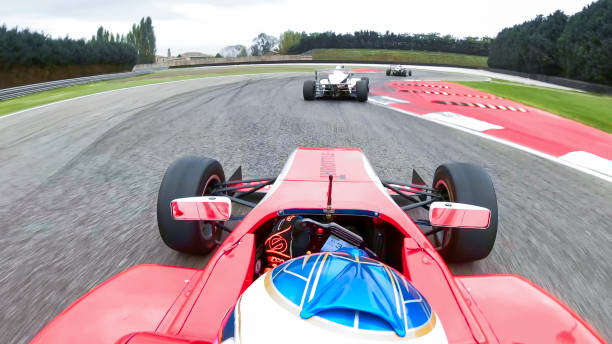 istock Racing cars driving on track 1191633088