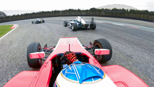 istock Racing cars driving on track 1191633091