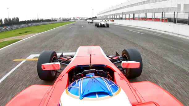 istock Racing cars driving on track 1191633097