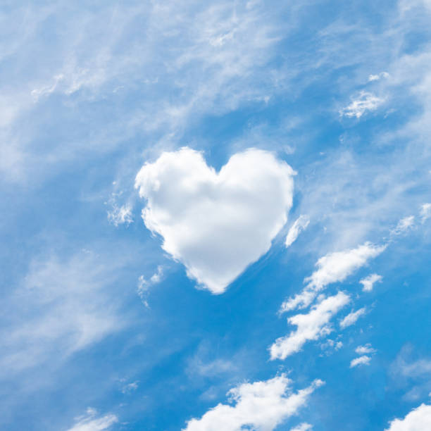 istock Heart shaped cloud against blue sky 1191633473