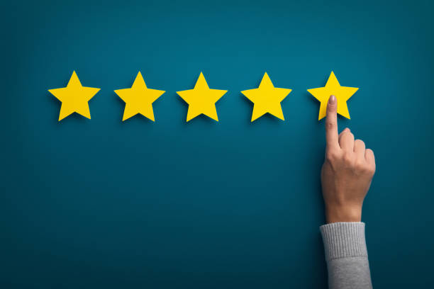 Woman hand showing on five star excellent rating Customer Experience Concept. Woman hand showing on five star excellent rating on background, copy space admiration stock pictures, royalty-free photos & images