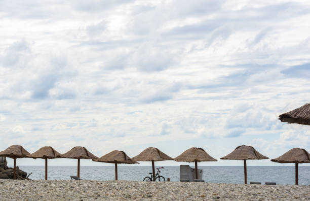 istock people relax on a pebbly sea beach 1191648269