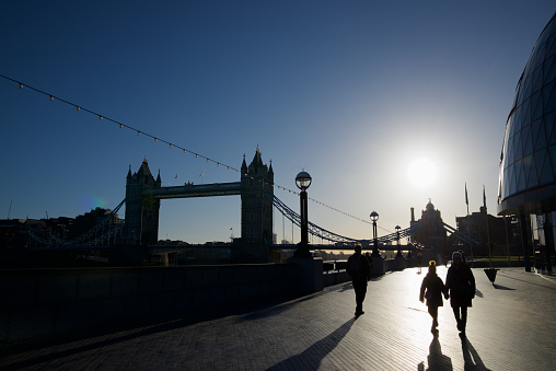 London, United Kingdom - March 5, 2019: people walking in the morning around the Tower Bridge.
