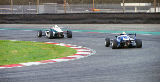 istock Racing cars driving track 1191655590