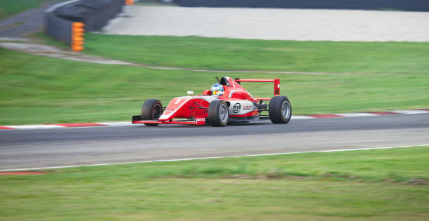 istock Driver driving racing car 1191655591