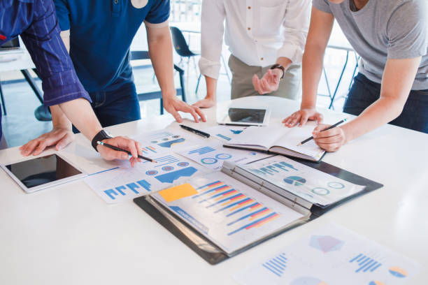 istock Business Corporate team brainstorming with chart and checking and analysis 1191656229
