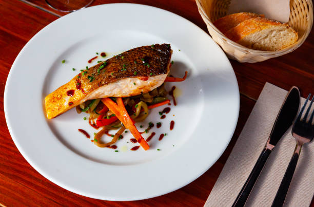 istock Grilled salmon with sauteed vegetables 1191658636